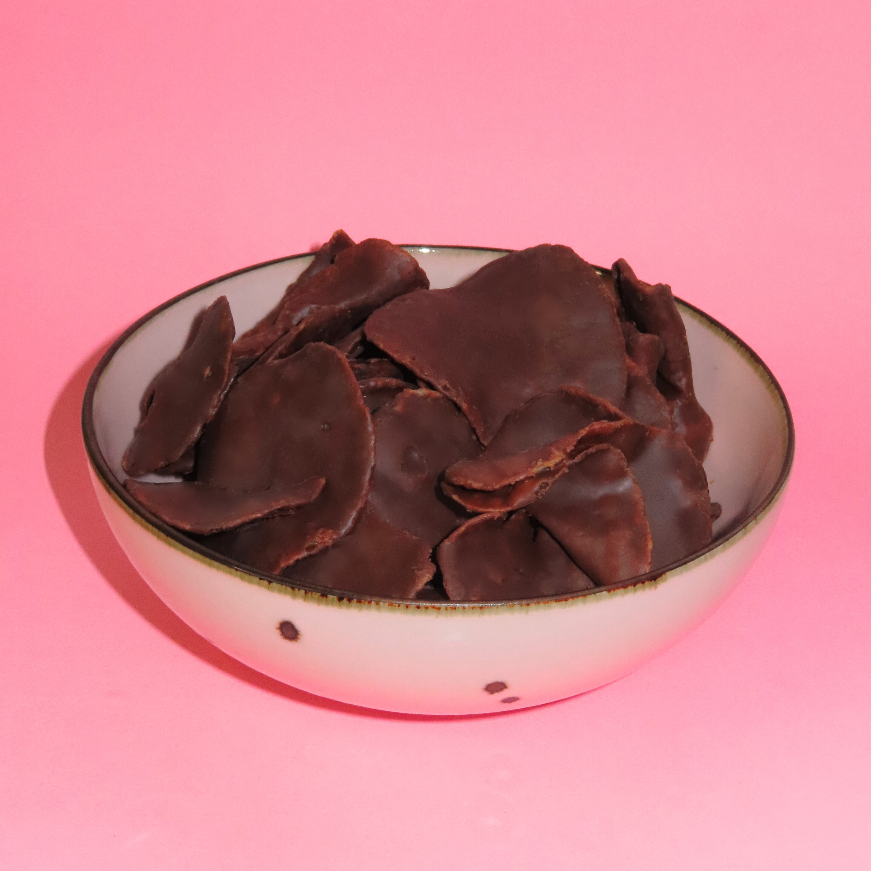 Bowl of chocolate-covered potato chips
